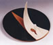 Piatto in terra refrattaria con simbolo natalizio.<br>
II° Premio per "Forme e voci del Natale", Museo del design Ceramico, Cerro.